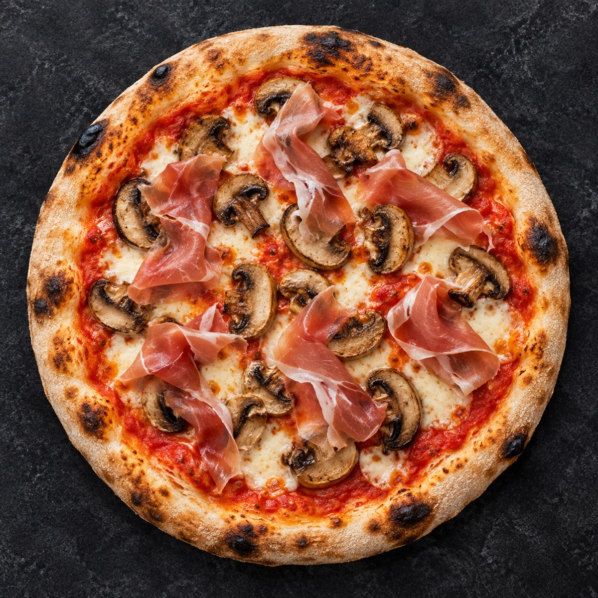 Prosciutto and mushroom pizza